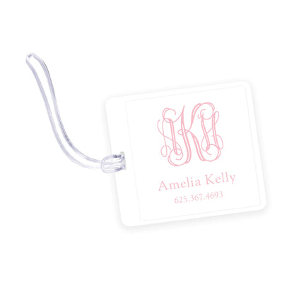 pink monogram square laminated bag tag