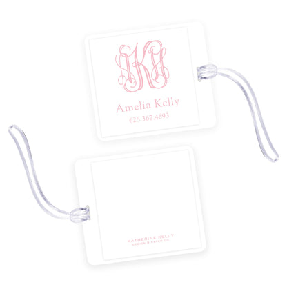 pink monogram square laminated bag tag